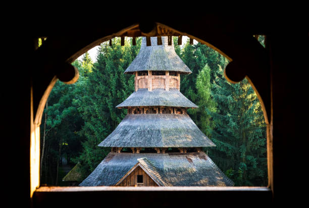 istock Romanian wooden monastery surrounded by lush green forest 855066038