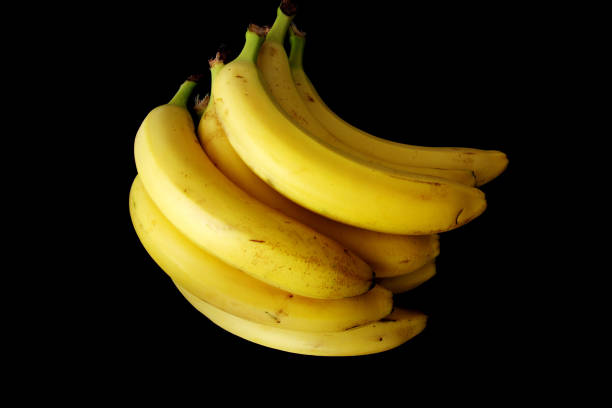 istock ripe bananas isolated on black 855070464