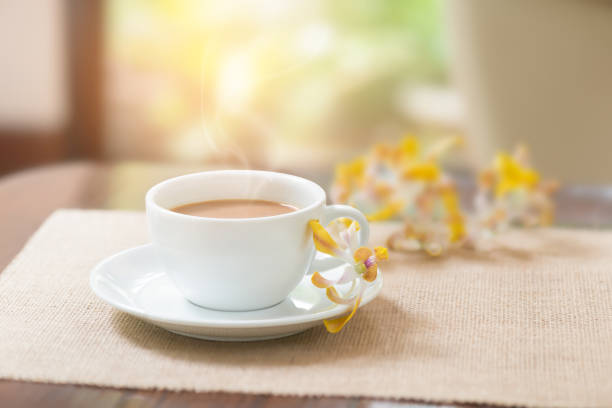 istock Morning coffee and flowers at home. 855070668