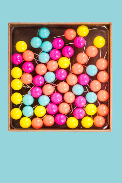 istock Box of colorful pastel push pins 855072970