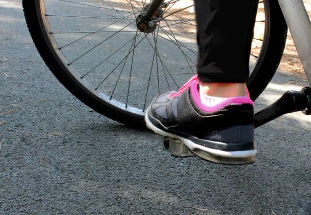 istock a woman drives bicycle 855073252