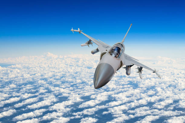 istock Military fighter jet above the clouds. 855074106