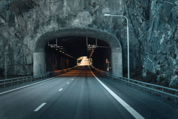 istock Road tunnel through rock in Sweden 855077066