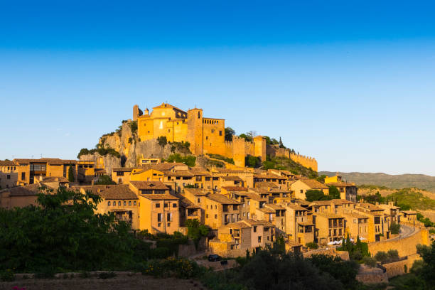 View of the medieval village of Alquezar at sunset. This beautiful town of Huesca is an important tourist destination in the Spanish region of Aragon.