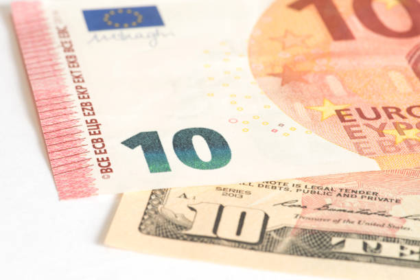 istock Banknotes 10 euros and 10 dollars 855081380