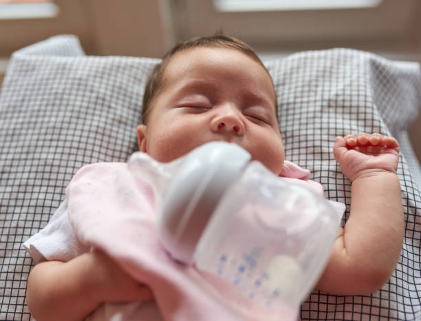 istock innocent baby girl sleeping 855081444