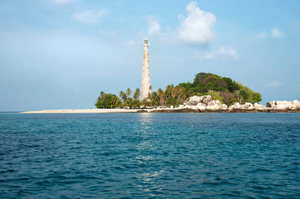 istock White lighthouse standing on an island in Belitung. 855086080