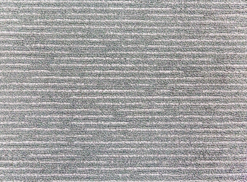 close up on grey carpet texture, abstract background.