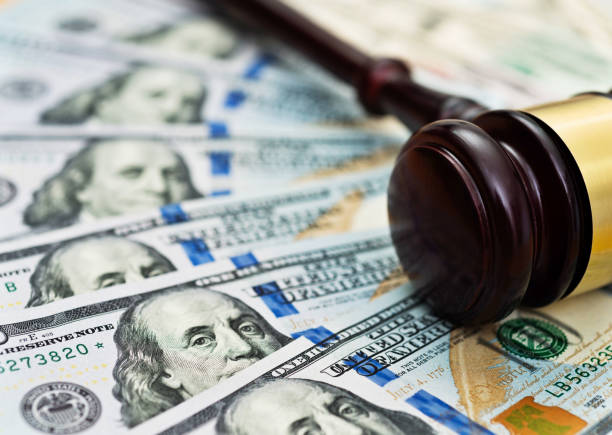 istock American one hundred dollar bills and gavel 855117402