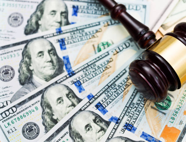 istock American one hundred dollar bills and gavel 855120944