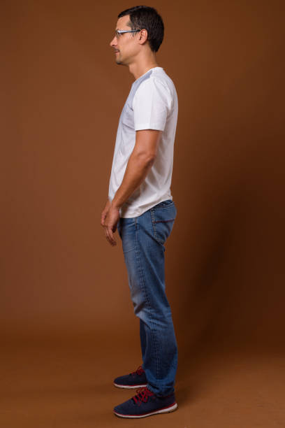 istock Studio shot of handsome man wearing eyeglasses against colored background 855124348