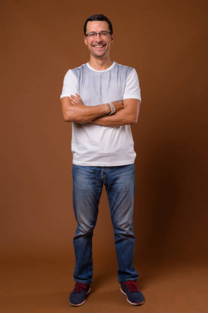 istock Studio shot of handsome man wearing eyeglasses against colored background 855124426