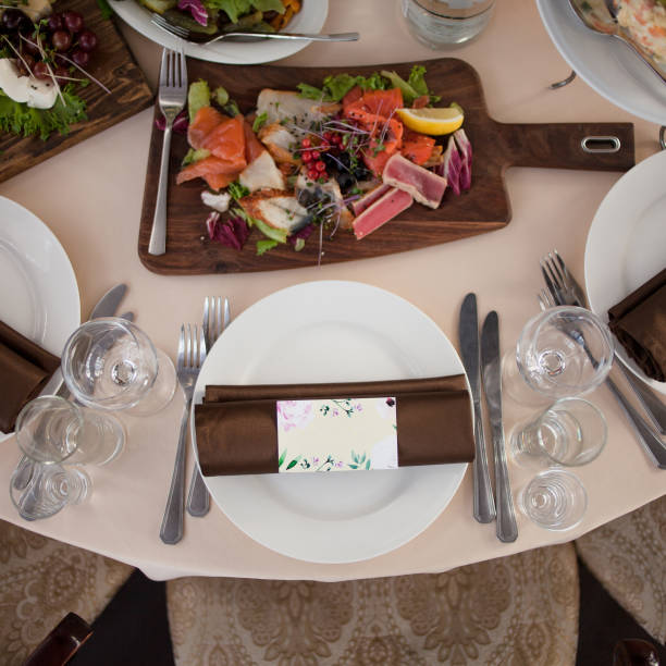 istock Table setting in the restaurant. Guest card and tapas 855124620