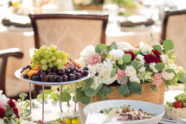 istock Wedding decor. Flowers in the restaurant, food on the table 855124842