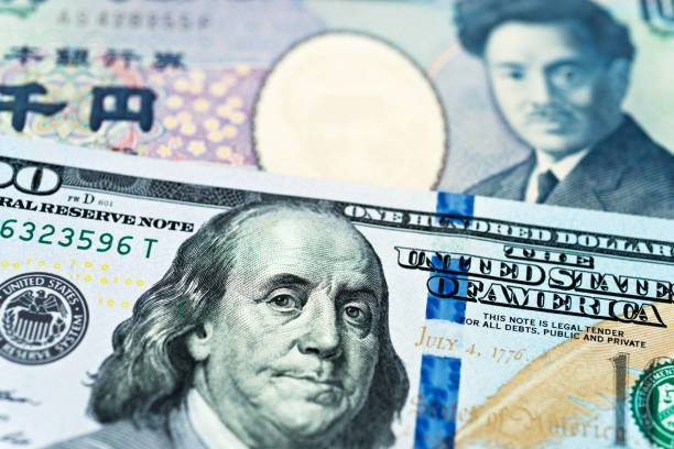 us dollars and japanese currency background - moeda japonesa imagens e fotografias de stock