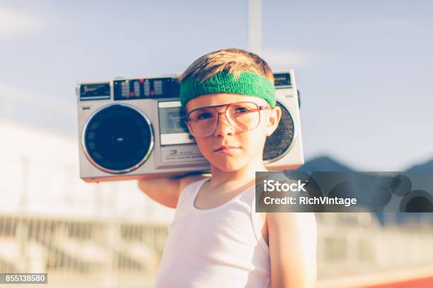 Young Retro Fitness Boy Listening To Music Stock Photo - Download Image Now - Child, 1980-1989, Retro Style