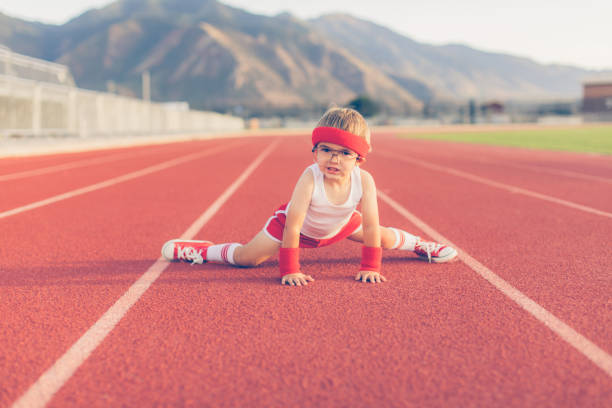istock Young Retro Fitness Boy Stretching 855138624