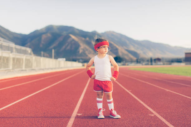 istock Young Retro Boy Athlete and Fitness Instructor 855138644
