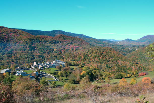 istock french village in autumnal landscape in Pyrenees. 855141532