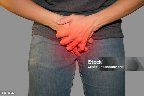 Boy Is Suffering And Holding His Genitals Stock Photo - Download Image Now - Penis, Pain, Treponema Pallidum