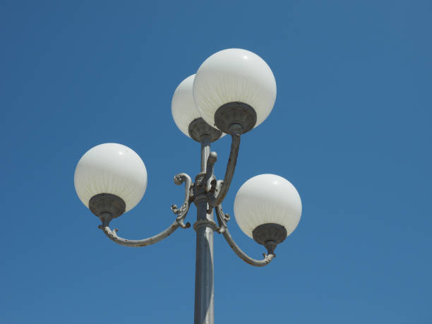 istock street lamp over blue sky 855144448