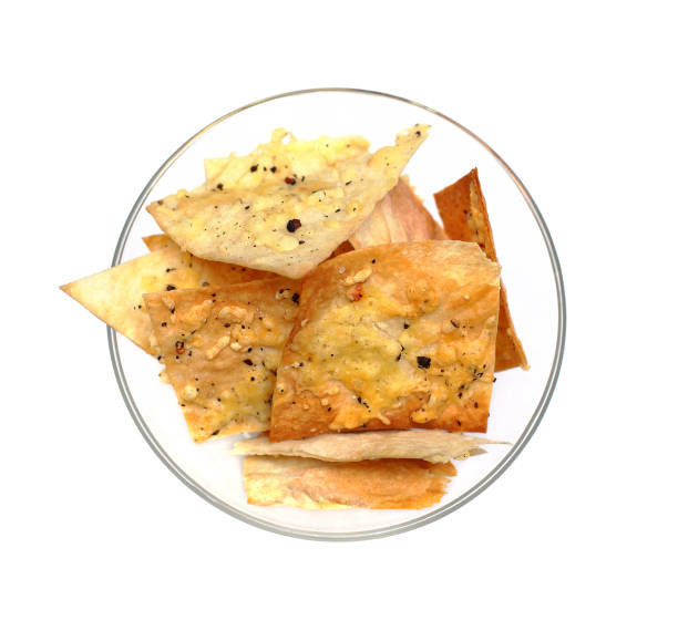 istock Nachos chips isolated - mexican cuisine, top view 855150494
