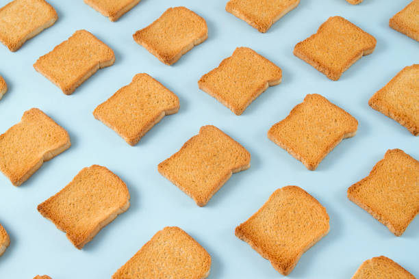 Slice of Toasted Bread on Blue Background
