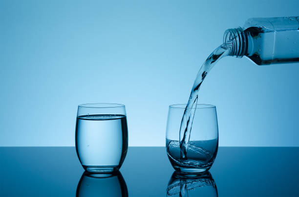 istock Creative splashing water in the glass 855153960