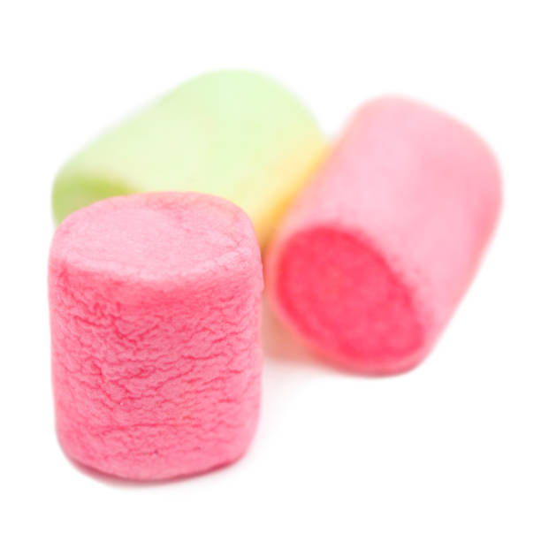 istock Colorful small marshmallows isolated on white background, macro. Fluffy marshmallows texture and pattern. High Resolution image 855155954