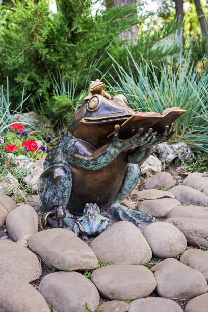 istock Copper sculpture of the reading frog 855161836