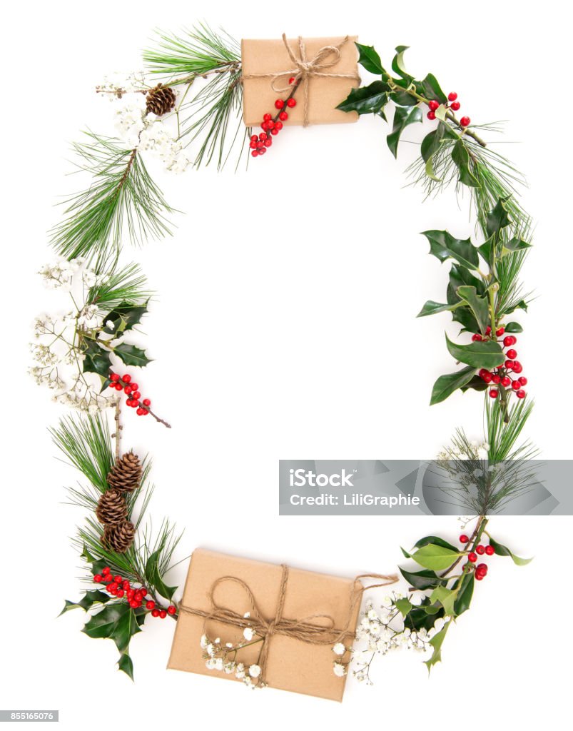 Christmas decoration gifts plants cones floral flat lay Christmas decoration with gifts, plants, cones on white background. Floral flat lay Berry Stock Photo