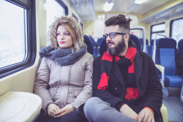 istock Happy couple traveling by train 855169944