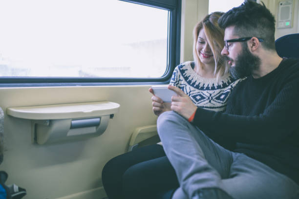istock Happy couple traveling by train 855172254