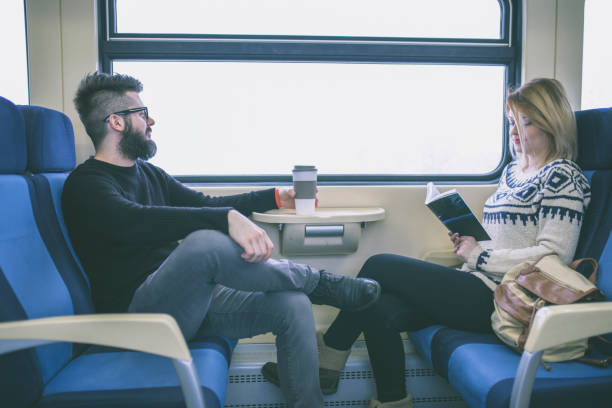 istock Couple traveling by train 855172872