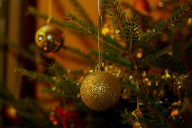 Photo of christmas tree in evening with lights on stock photo