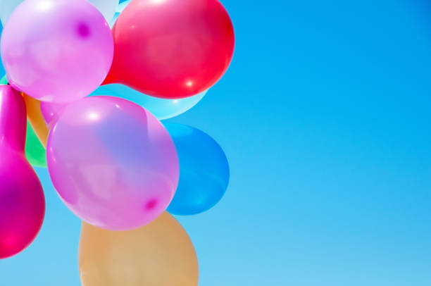 istock Multicolored balloons against the blue sky 855179666