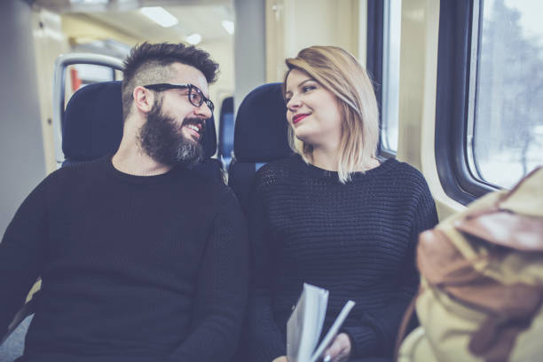 istock Happy couple traveling by train 855180376
