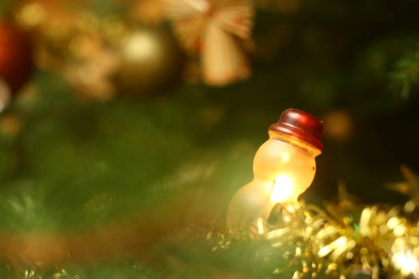 Photo of christmas tree in evening with lights on stock photo