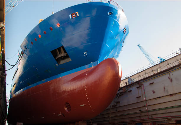 istock Big ship under repair in dry dock 855180734