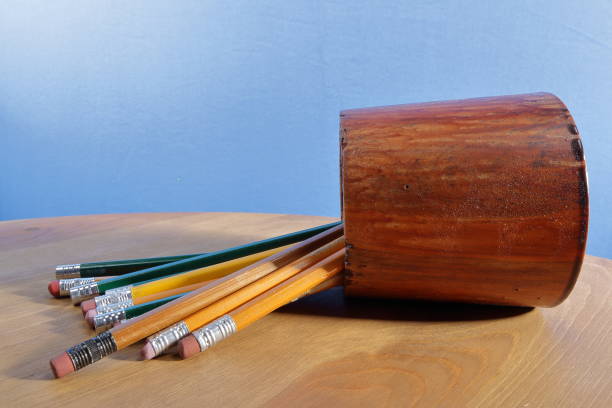 Found in the woodshop:  several pencils in a handmade wooden lathe turned container stand ready to mark measurements on projects
