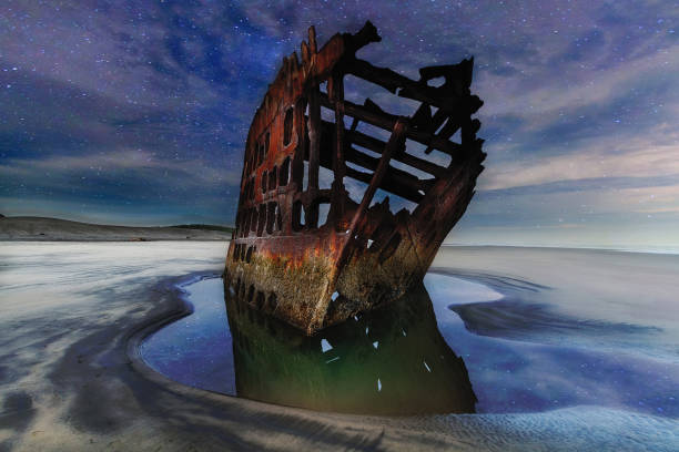 Starry Night Sky over Peter Iredale Shipwreck stock photo
