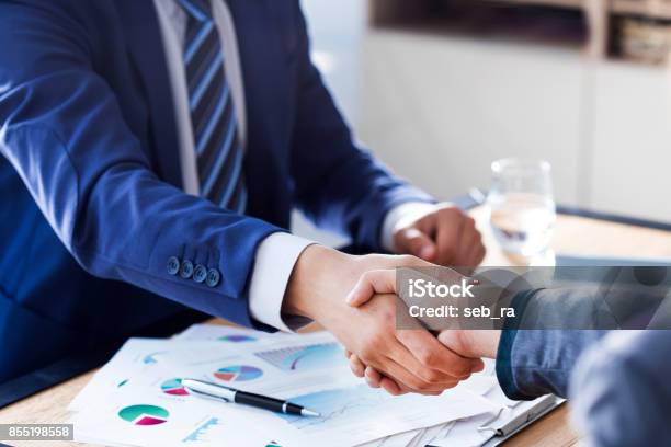 Business Handshake In The Office Stock Photo - Download Image Now - Business, Insurance Agent, Advice