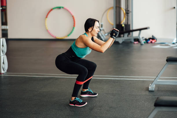 istock cute fit girl doing leg exercises 855198914