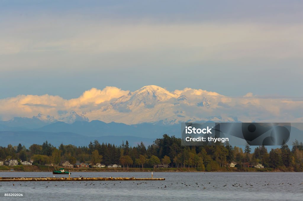 Mount Baker from Semiahmoo Bay in Blaine Washington Mount Baker along Semiahmoo Bay waterfront homes in Blaine Washington State Washington State Stock Photo