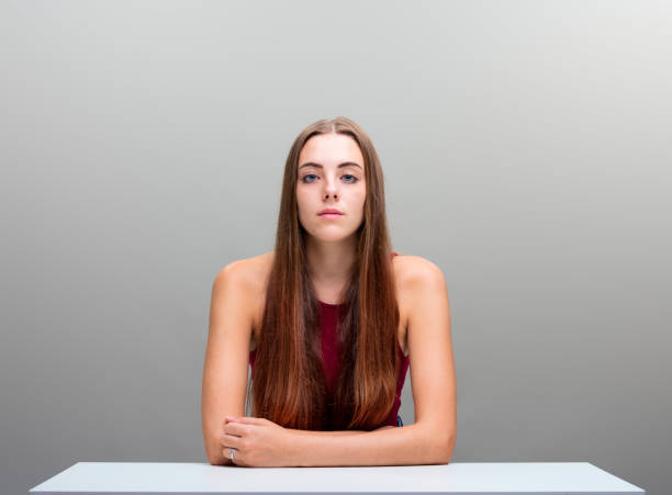 istock beautiful long hair woman on gray copyspace 855202046