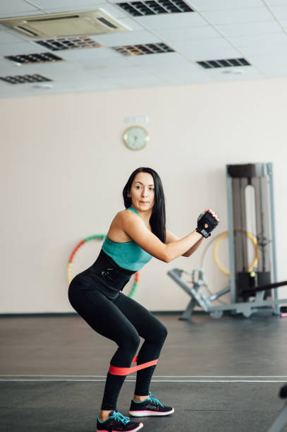 istock cute fit girl doing leg exercises 855204764
