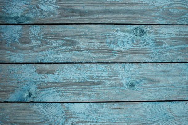 istock Texture of old boards with blue peeling paint. Background 855204946