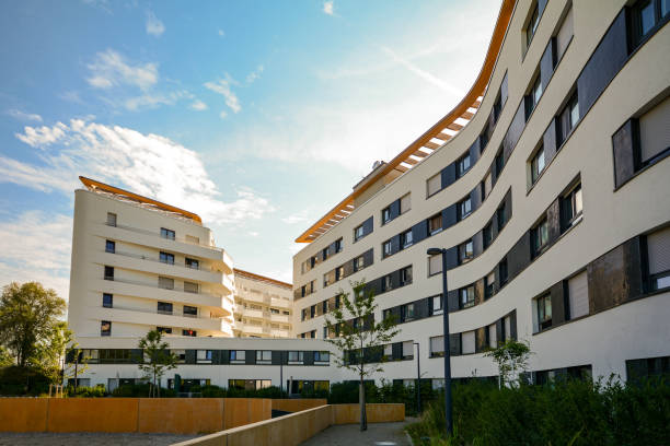 new residential and commercial building with modern facade in the city - residential district housing development house uk imagens e fotografias de stock