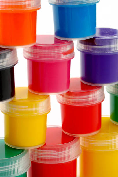 istock paints of different colors and slim paintbrush (brush) 855218104