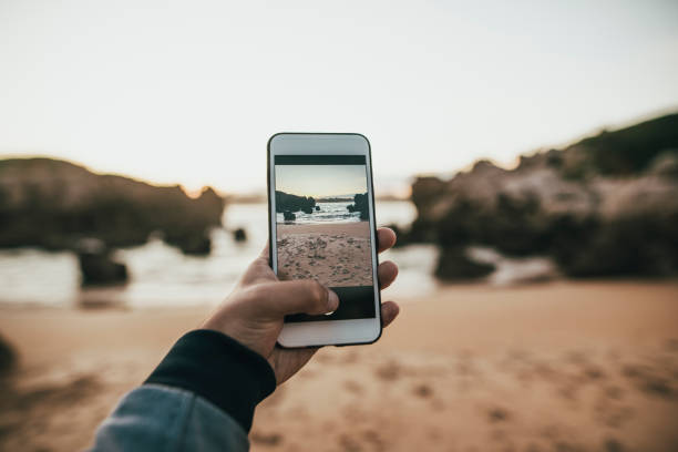 istock Taking a photo of a beach 855218200
